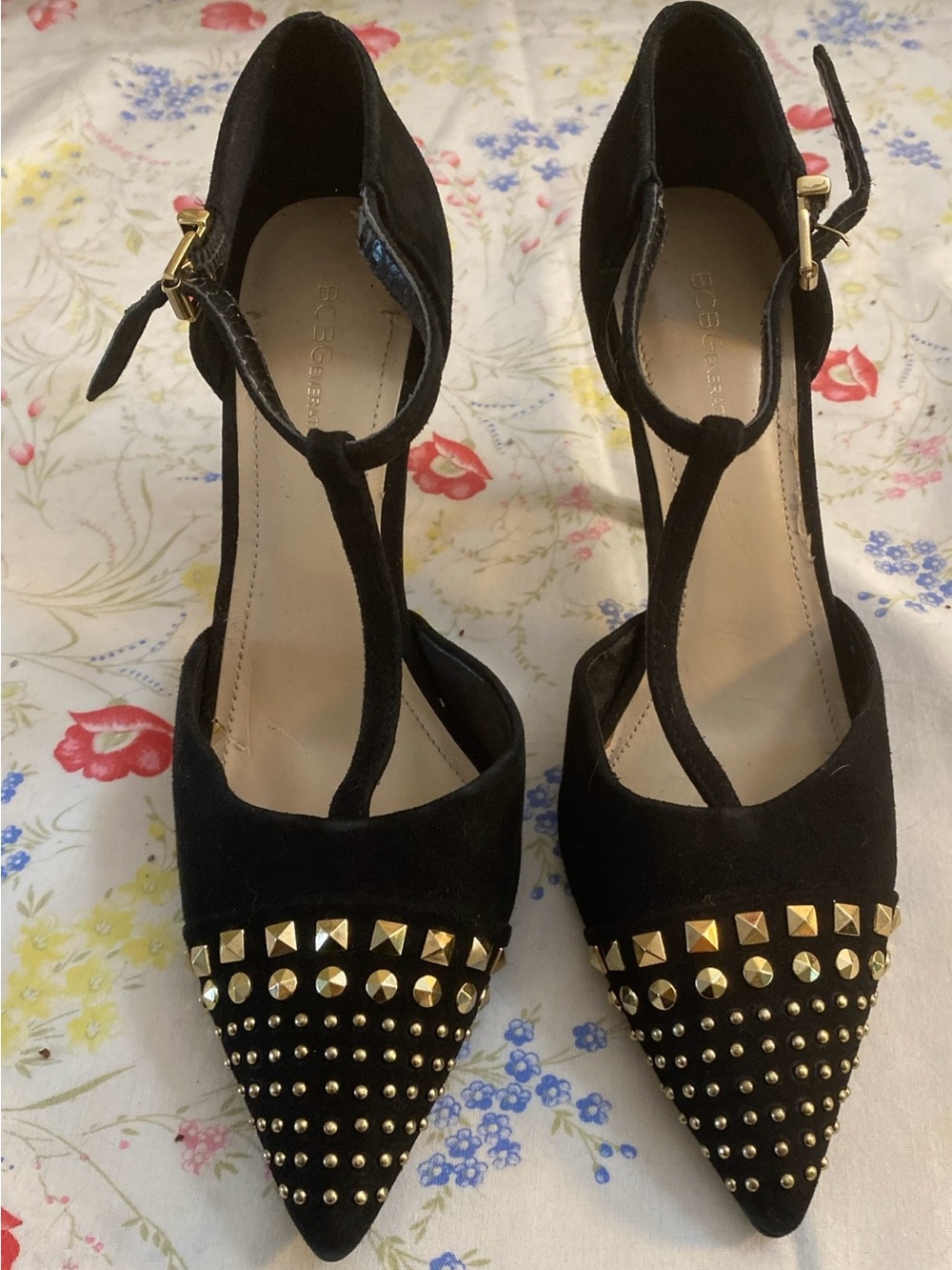 BCBGeneration Black Pointed-Toe T-Strap Heels with Gold Studs